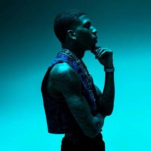Rising star Nle Choppa caught in a candid moment nle choppa wallpaper