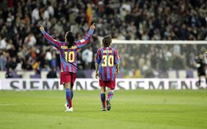 Ronaldinho And Messi ronaldinho wallpaper