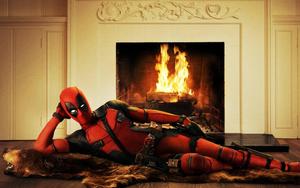 Seductive Deadpool On A Fireplace deadpool wallpaper