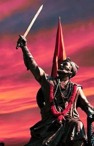 Shivaji Maharaj Holding Sword Up In Air shivaji maharaj wallpaper
