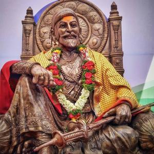 Shivaji Maharaj Statue Sitting With Hand On Knee shivaji maharaj wallpaper