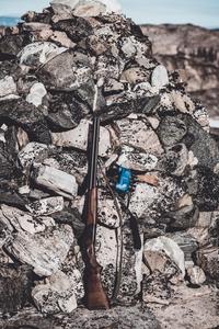 Shotgun Beside Rubble gun wallpaper