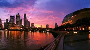 Singapore's skyline glowing in the night sky. landscape wallpaper