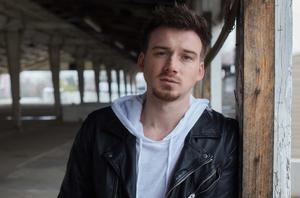 Singer Morgan Wallen smiles proudly while performing at Stagecoach Festival morgan wallen wallpaper