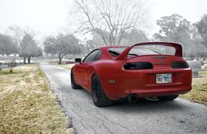 Sleek and Stunning Supra Sports Car in the City supra wallpaper