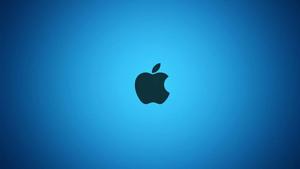 Sleek Apple Logo on Vibrant Gradient Background apple logo wallpaper