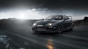 Sleek Toyota Supra in a scenic environment supra wallpaper