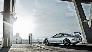 Sleek Toyota Supra sports car on a stunning road supra wallpaper