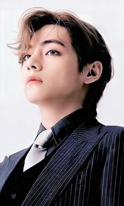 Smiling V of BTS at a promotional event. bts v wallpaper