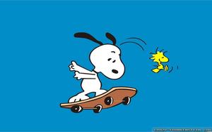 Snoopy and Woodstock catching some thrills on their skateboard. snoopy wallpaper