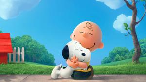 Snoopy the lovable beagle curled up on the branch of a tree snoopy wallpaper