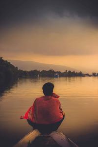 Solitude in Serenity - A Lone Boy Reflecting on Life alone boy wallpaper