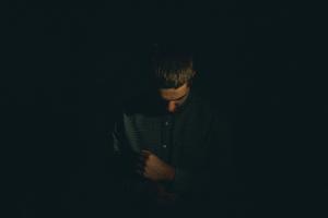 Solitude in Shadows - A Portrait of a Sad Boy sad boy wallpaper