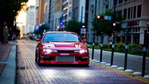 Speed and Style: Red Nissan Silvia S14 1080p wallpaper