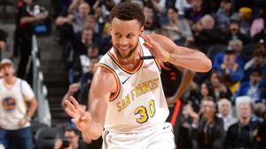 Stephen Curry shooting a three-pointer during an intense game stephen curry wallpaper