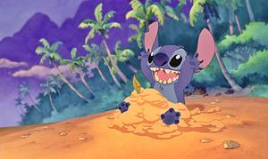 "Stitch Relaxing and Having Fun in the Sand" Wallpaper