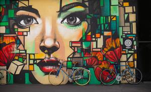 Street Graffiti of a Bold, Powerful Woman art wallpaper