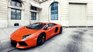 Streets of London lit up by an orange Lamborghini Aventador lamborghini wallpaper