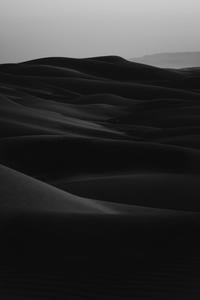 Stretching out Against the Sand black screen wallpaper