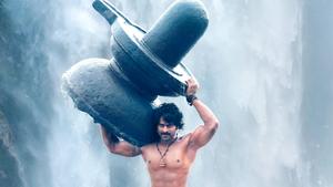 Strong Prabhas Carrying Stone prabhas wallpaper