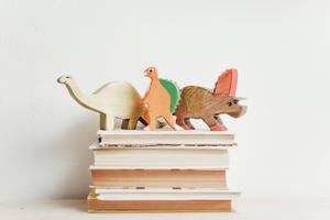 Study Motivation Dinosaur Figurines on Books study motivation wallpaper
