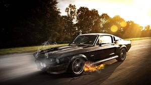 Stunning Luxury Car on Scenic Road Wallpaper