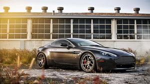 Stunning Red Sports Car in Motion Wallpaper