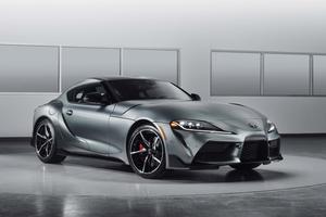 Stunning Toyota Supra Sports Car on Scenic Road supra wallpaper