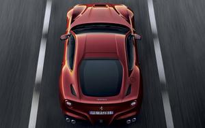 Supercar speed and power - a red Ferrari car wallpaper