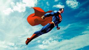 Superman Poses in Dramatic Skyscape superman wallpaper