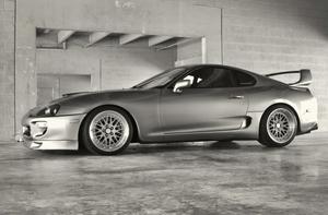 Supra Sports Car on Open Road supra wallpaper