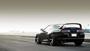 Supra Sports Car on the Road Wallpaper