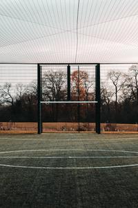 Surrounded by a sense of anticipation, the football field awaits its challengers. football wallpaper