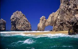 Take a Relaxing Stroll Along the Rocky Beach beach wallpaper