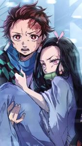 Tanjiro embraces a crying Nezuko tanjiro wallpaper
