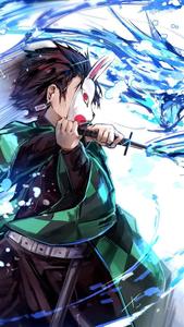Tanjiro in his traditional Shinobi attire, ready to fight against evil with the power of water. tanjiro wallpaper