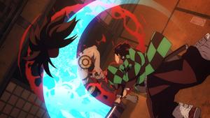 Tanjiro Kamado Fighting Lower Moon in Demon Slayer Wallpaper