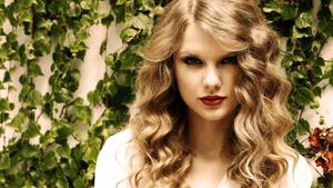 Taylor Swift with beautiful, cascading curls taylor swift wallpaper