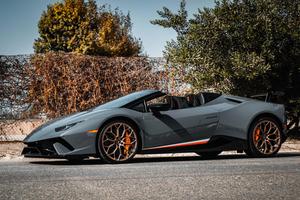 the 2019 lamborghini huracan parked on the side of the road lamborghini wallpaper