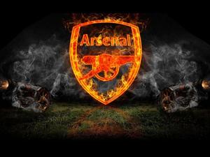 The Arsenal football team in action during a Premier League match arsenal wallpaper