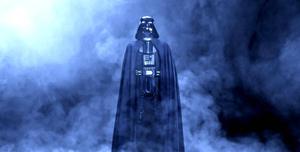 The Dark Lord of the Sith emerges from the shadows darth vader wallpaper