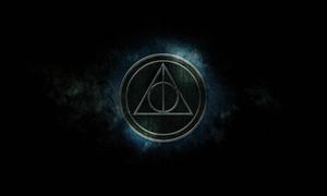 The Deathly Hallows Symbol from the Harry Potter Series harry potter wallpaper