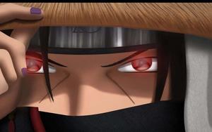 The enigmatic Itachi Uchiha stands with confidence in the glow of the moonlight.  Wallpaper