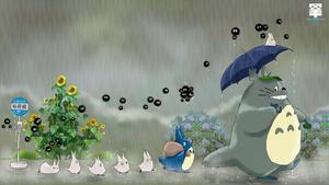 The friendly forest creature, Totoro, from the beloved classic animated film. totoro wallpaper