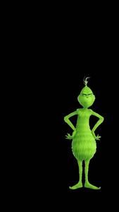 The Grinch can't resist his holiday cheer. grinch wallpaper