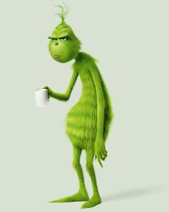 the grinch is holding a cup of coffee grinch wallpaper