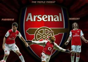 The iconic Arsenal Stadium under a stunning sunset arsenal wallpaper
