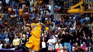 The legendary Kobe Bryant showing off his signature dunk move kobe bryant wallpaper