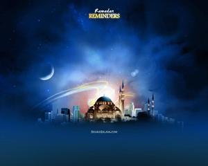 The majestic Islamic mosque stands strong against the night sky. islamic wallpaper