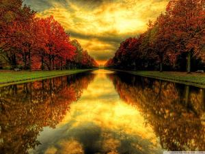 The river turns red amidst the Autumn season fall wallpaper